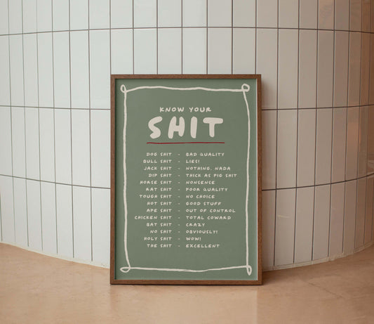 Framed poster with text on a tiled wall