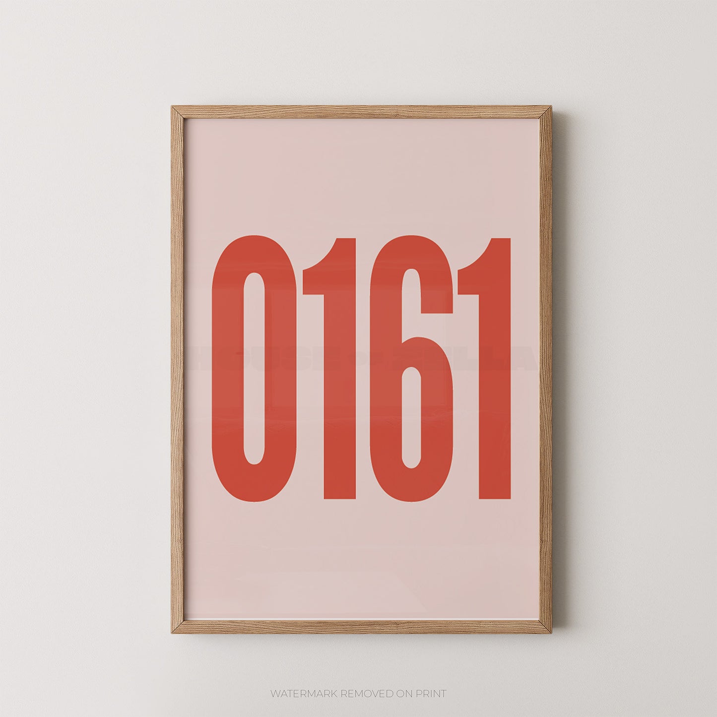 A framed minimalist art print featuring the red-orange numbers '0161' on a pale pink background, enclosed in a light natural wood frame and mounted on a light gray wall.