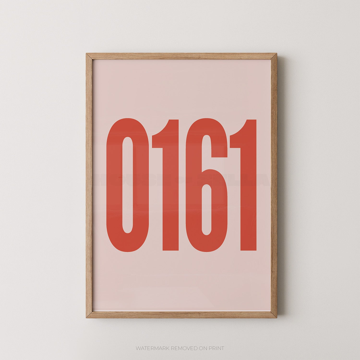 A framed minimalist art print featuring the red-orange numbers '0161' on a pale pink background, enclosed in a light natural wood frame and mounted on a light gray wall.