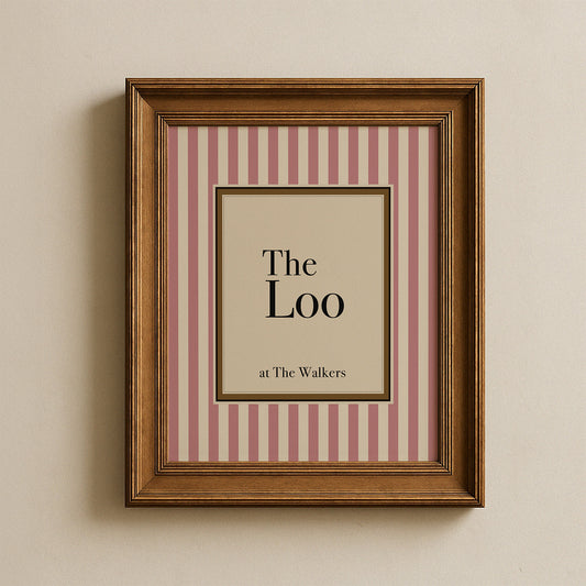 Framed print with striped pattern and text on a beige wall