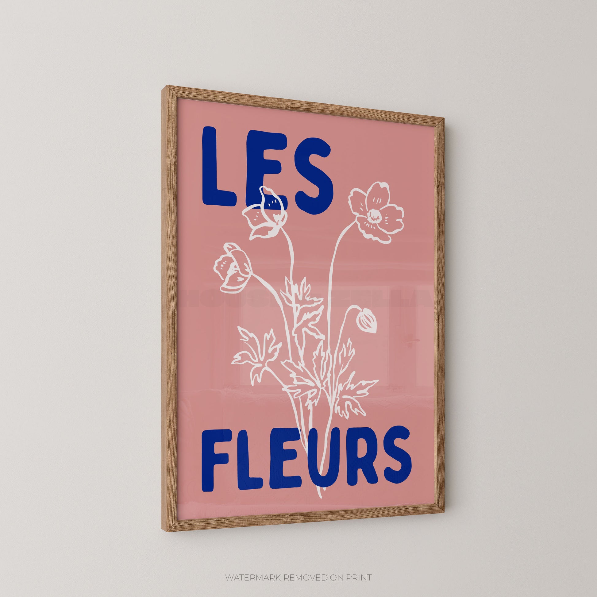 Les Fleurs botanical wall art print, blush pink floral poster with cream botanical illustration and bold blue typography.