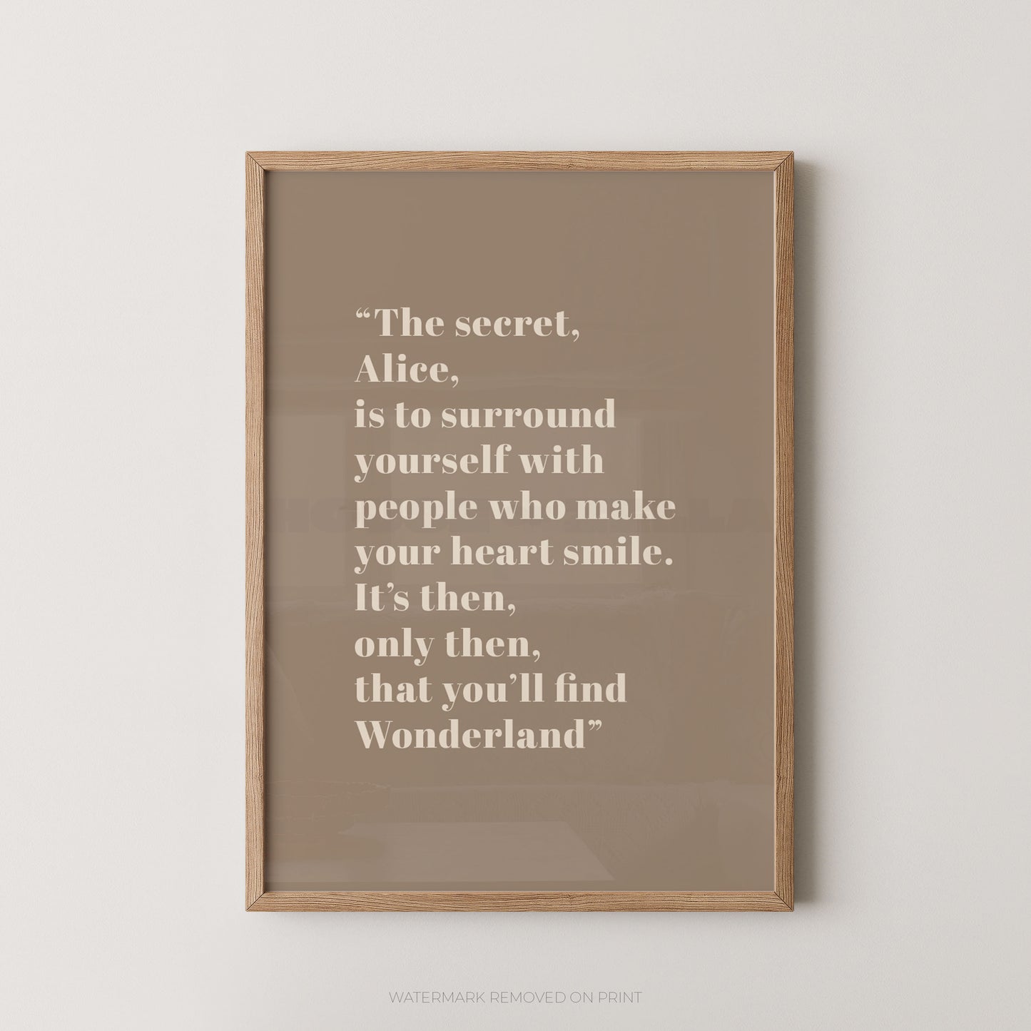 Framed print with a quote on a beige background
