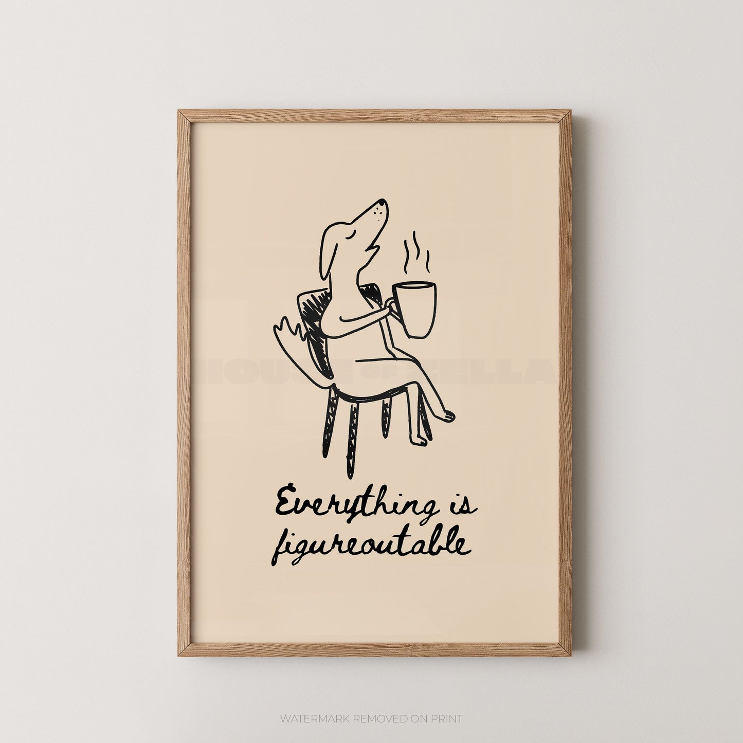 Framed artwork with a dog holding a coffee cup and 'Everything is figureoutable' text on a beige background.