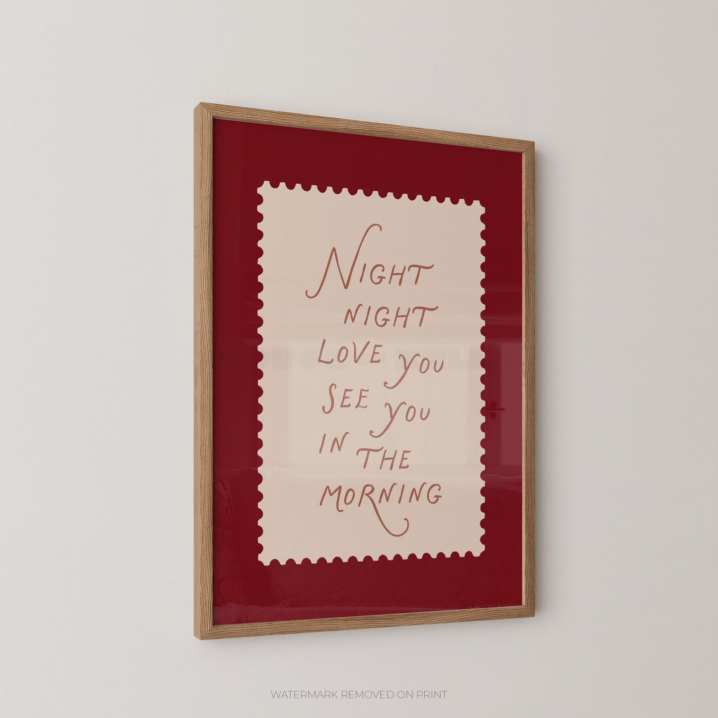 Framed artwork with text on a red background