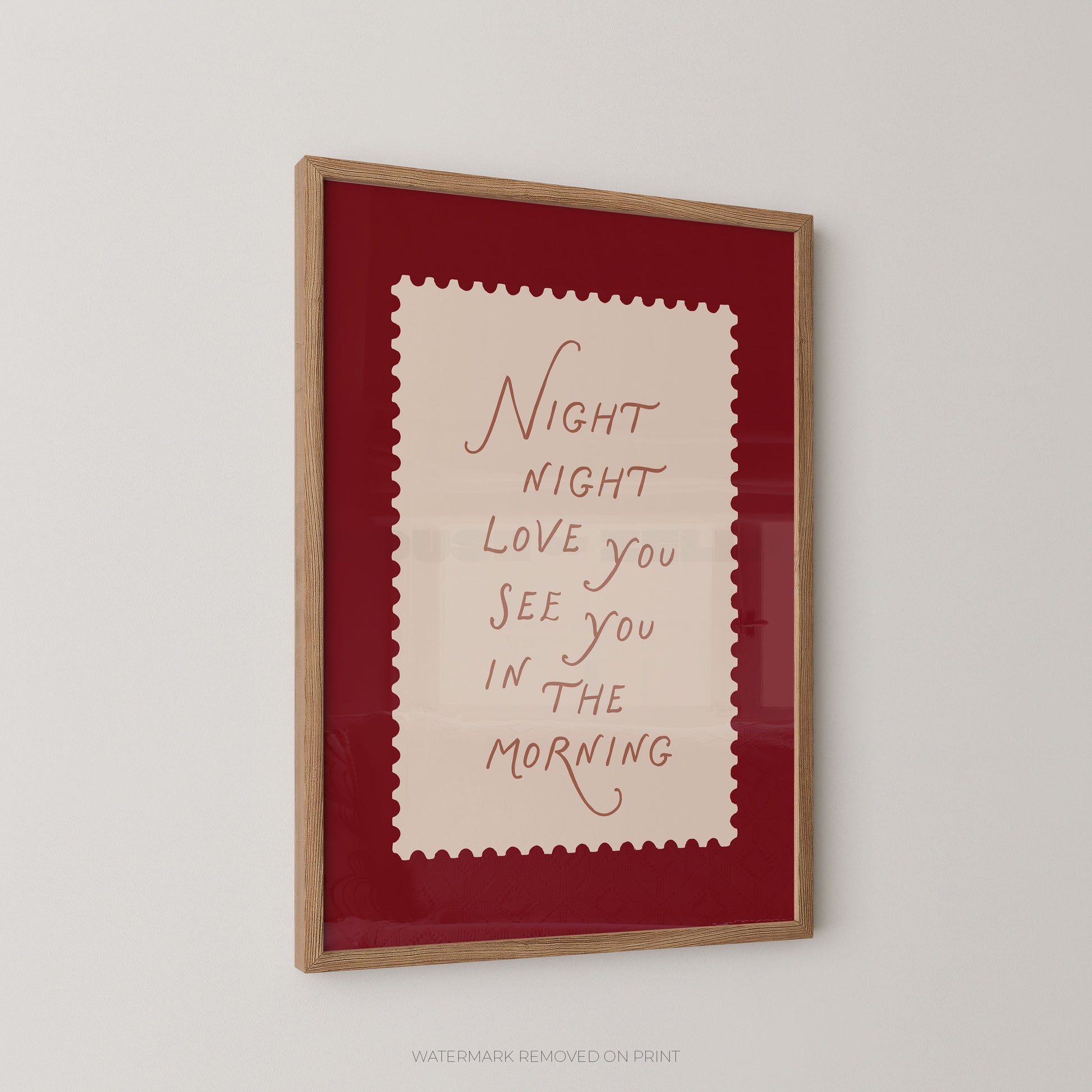 Framed artwork with text on a red background