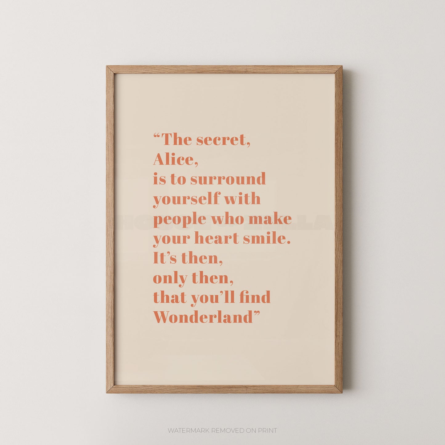 Framed print with a quote on a white wall