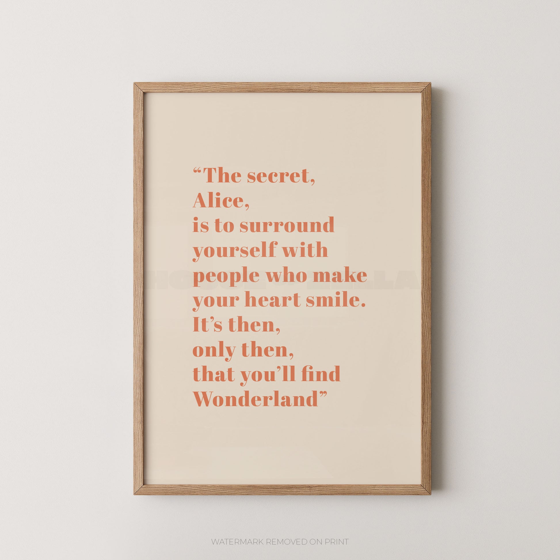 Framed print with a quote on a white wall