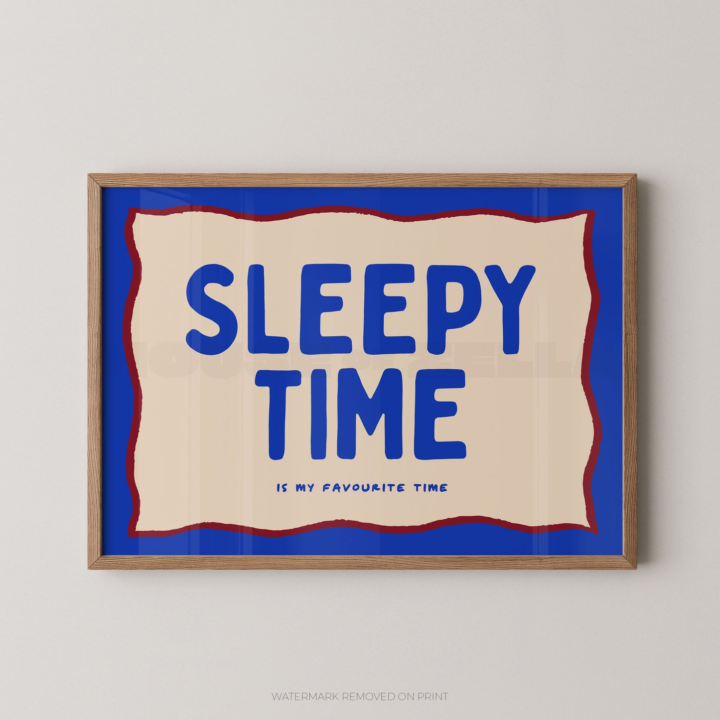Framed artwork with 'Sleepy Time is my favourite time' text on a blue background