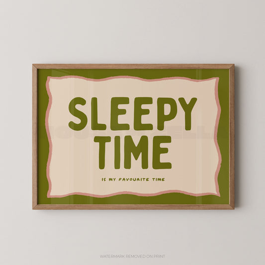 Framed artwork with 'Sleepy Time is my favourite time' text on a green background