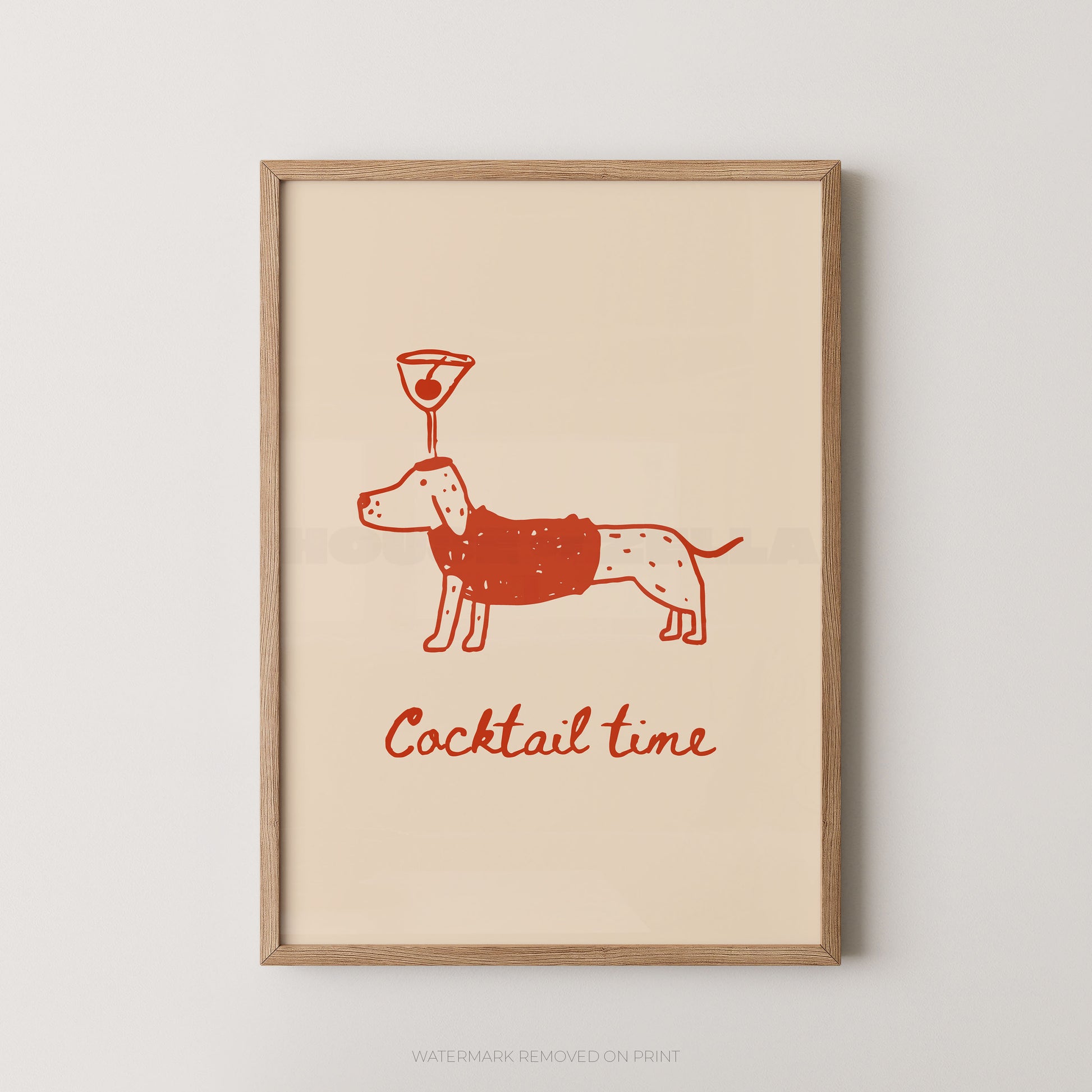 Framed wall art print with a minimalist red illustration of a dog wearing a sweater and a cocktail glass on its head, above the words 'Cocktail time' in red script, shown against a light neutral background.