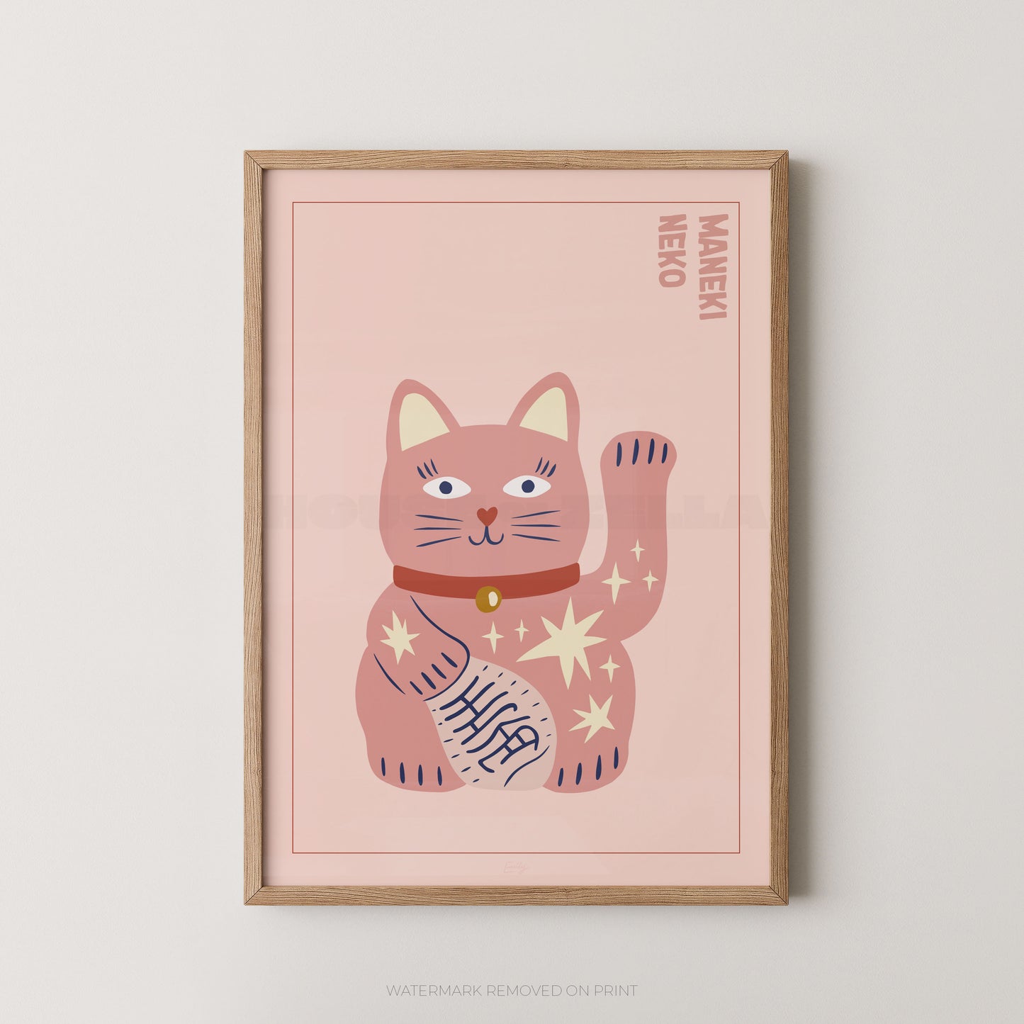 Framed artwork of a pink cat illustration on a light pink background