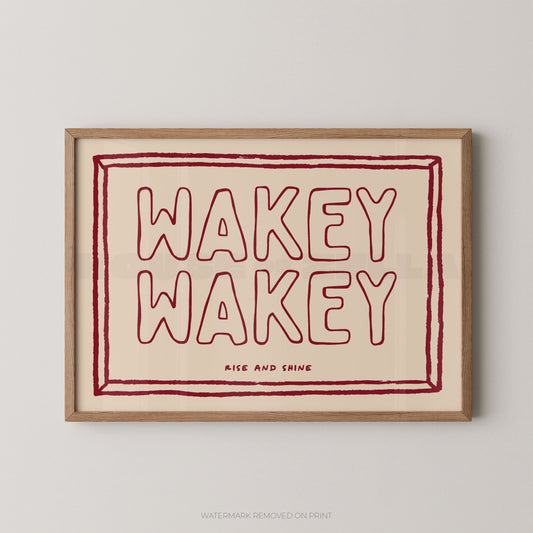 Framed artwork with 'Wakey Wakey' text on a beige background