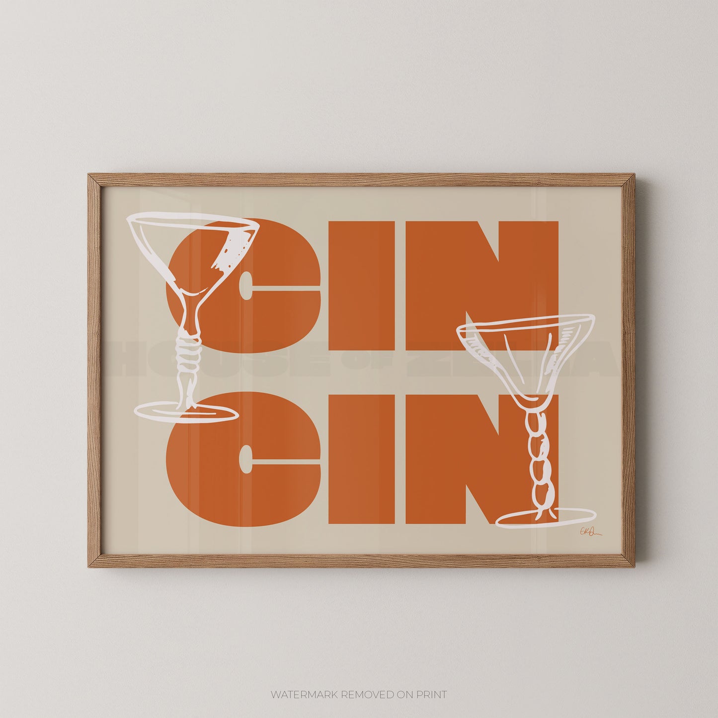 Framed artwork with 'GIN GIN' text and martini glass illustrations on a beige background.