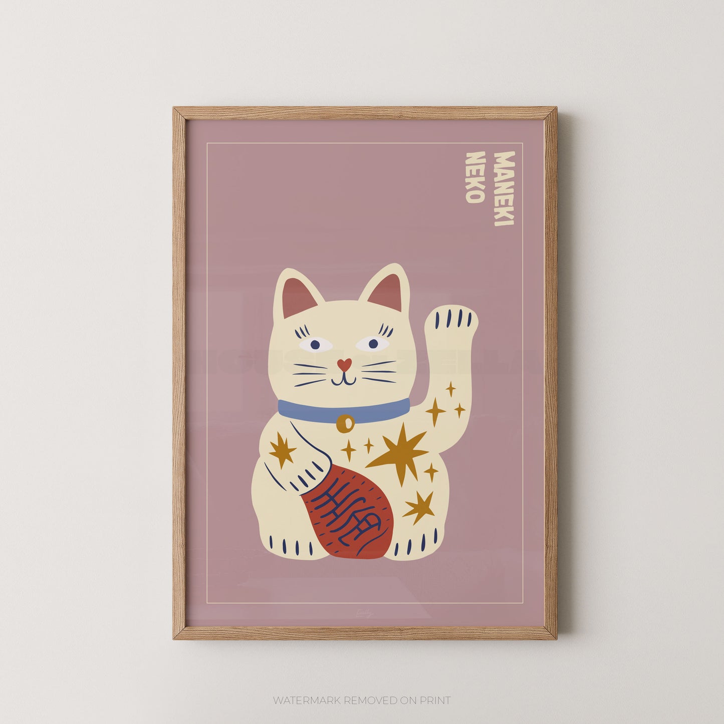 Framed artwork of a lucky cat illustration on a pink background