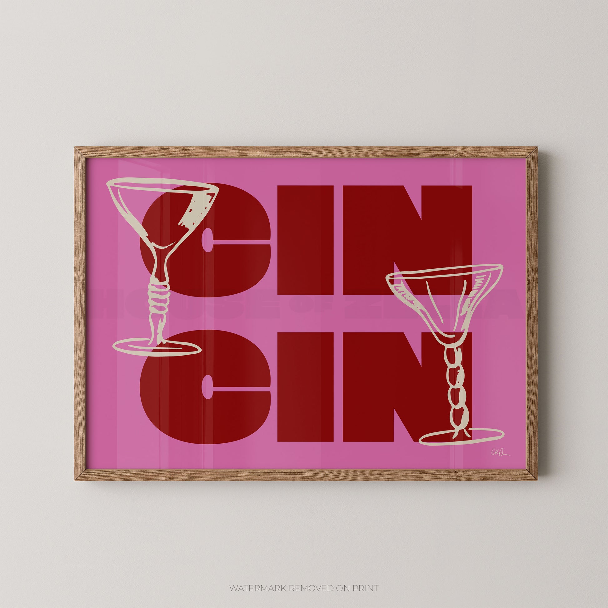 Framed artwork with 'CIN CIN' text and martini glass illustrations on a pink background.