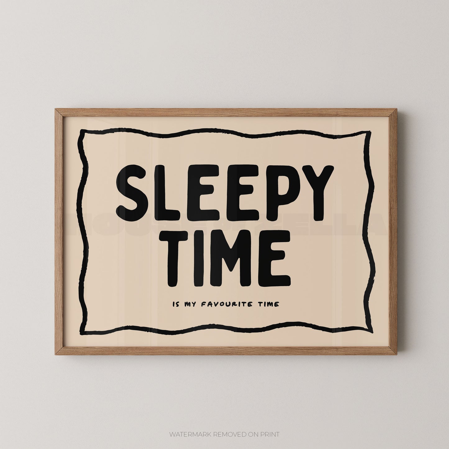 Framed artwork with 'Sleepy Time is my favourite time' text on a beige background