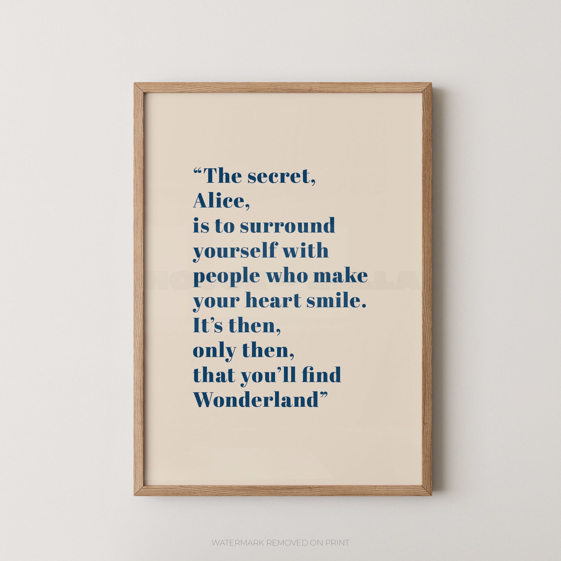 Framed print with a quote on a white wall