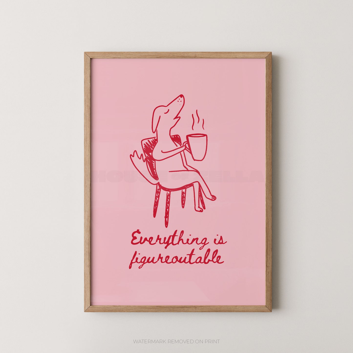 Framed pink poster with red illustration of a dog and text on a white wall