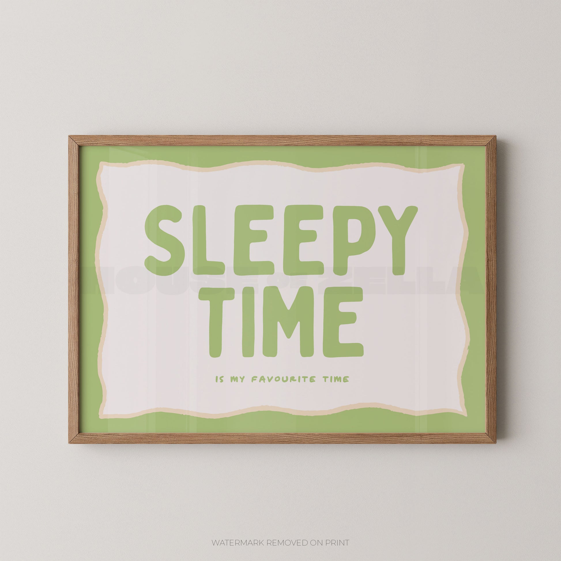 Framed artwork with 'Sleepy Time is my favourite time' text on a green background