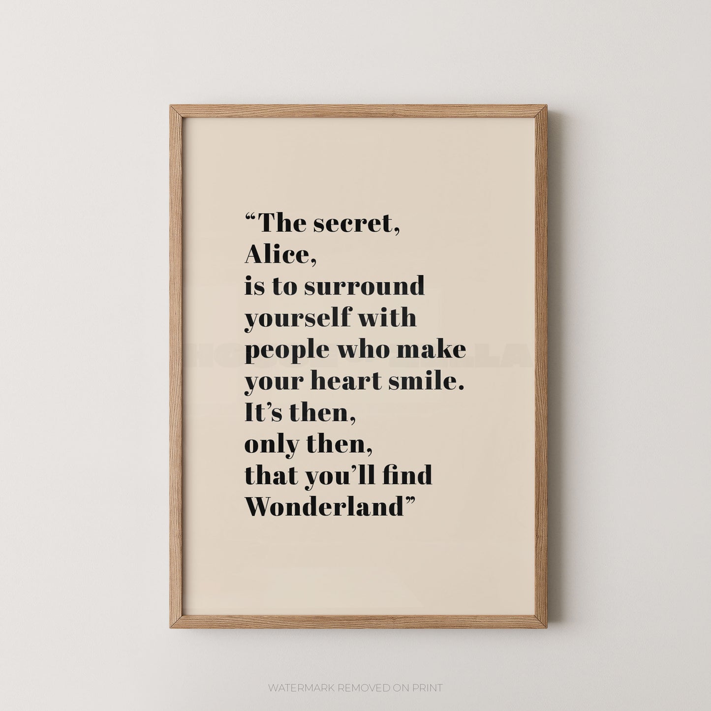 Framed print with a quote on a beige background