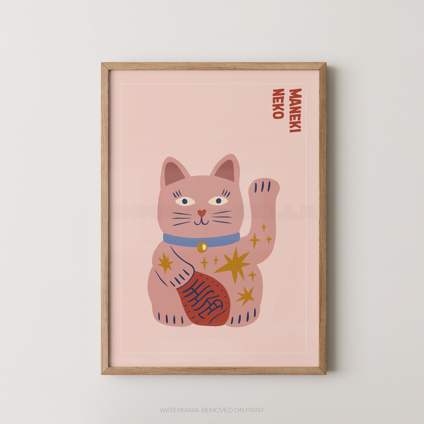 Framed artwork of a pink cat illustration with 'Maneki Neko' text on a light pink background.