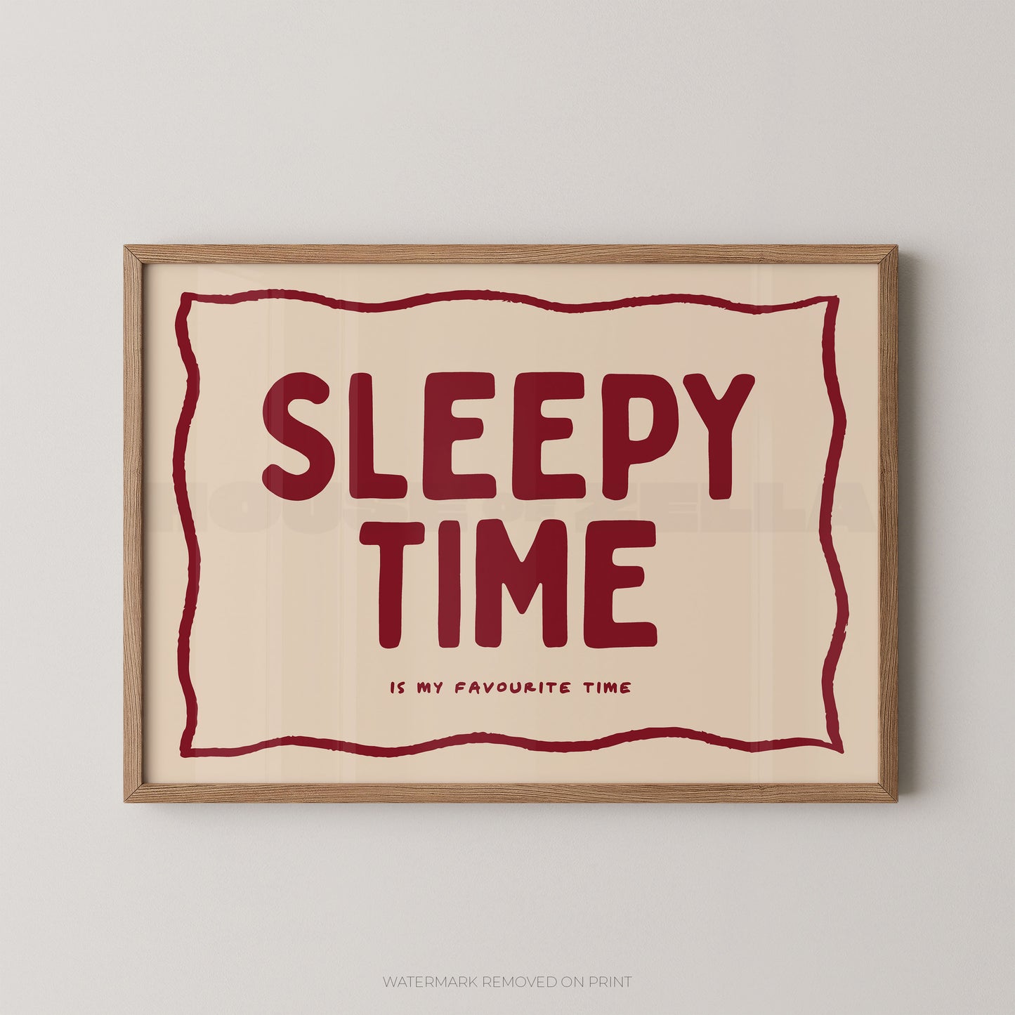 Framed artwork with 'Sleepy Time is my favourite time' text on a beige background