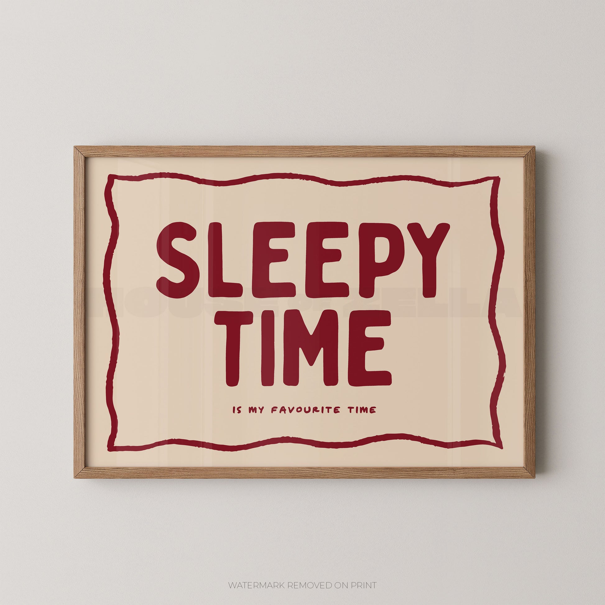 Framed artwork with 'Sleepy Time is my favourite time' text on a beige background
