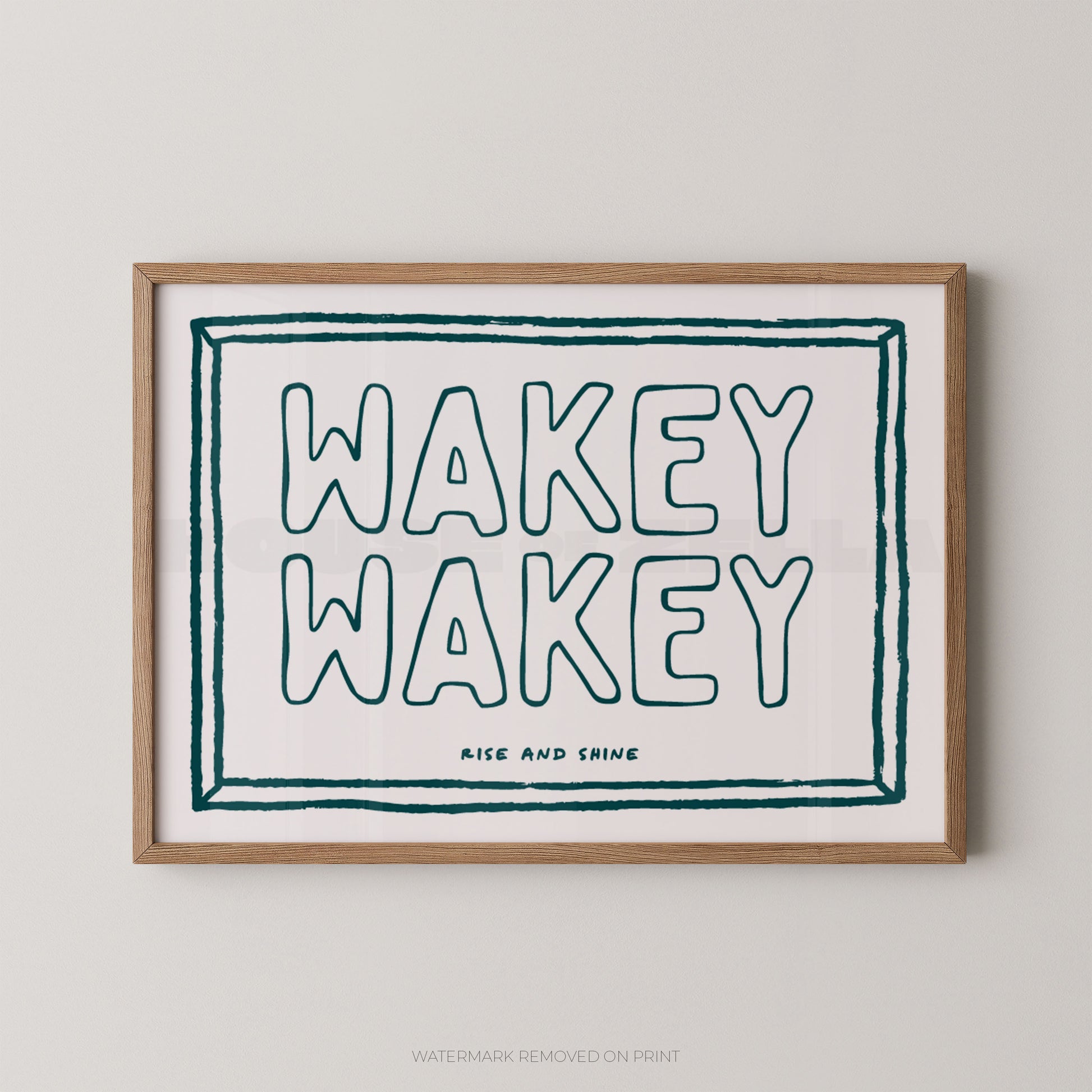 Framed print with 'Wakey Wakey' text on a plain background