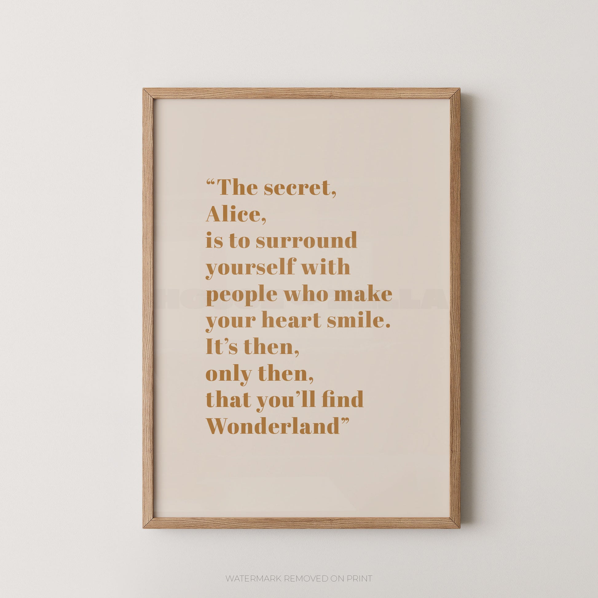 Framed print with a quote on a white wall