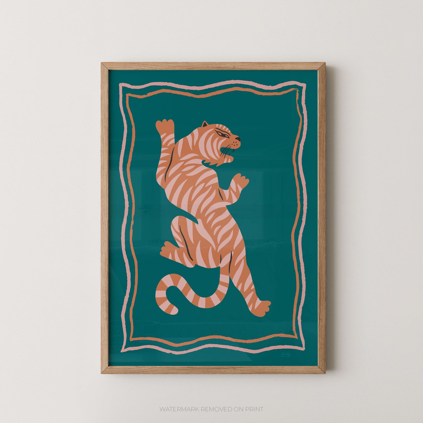 A framed art print featuring a stylized orange and white striped tiger on a deep teal background, enclosed in a light wood frame against a neutral off-white wall.
