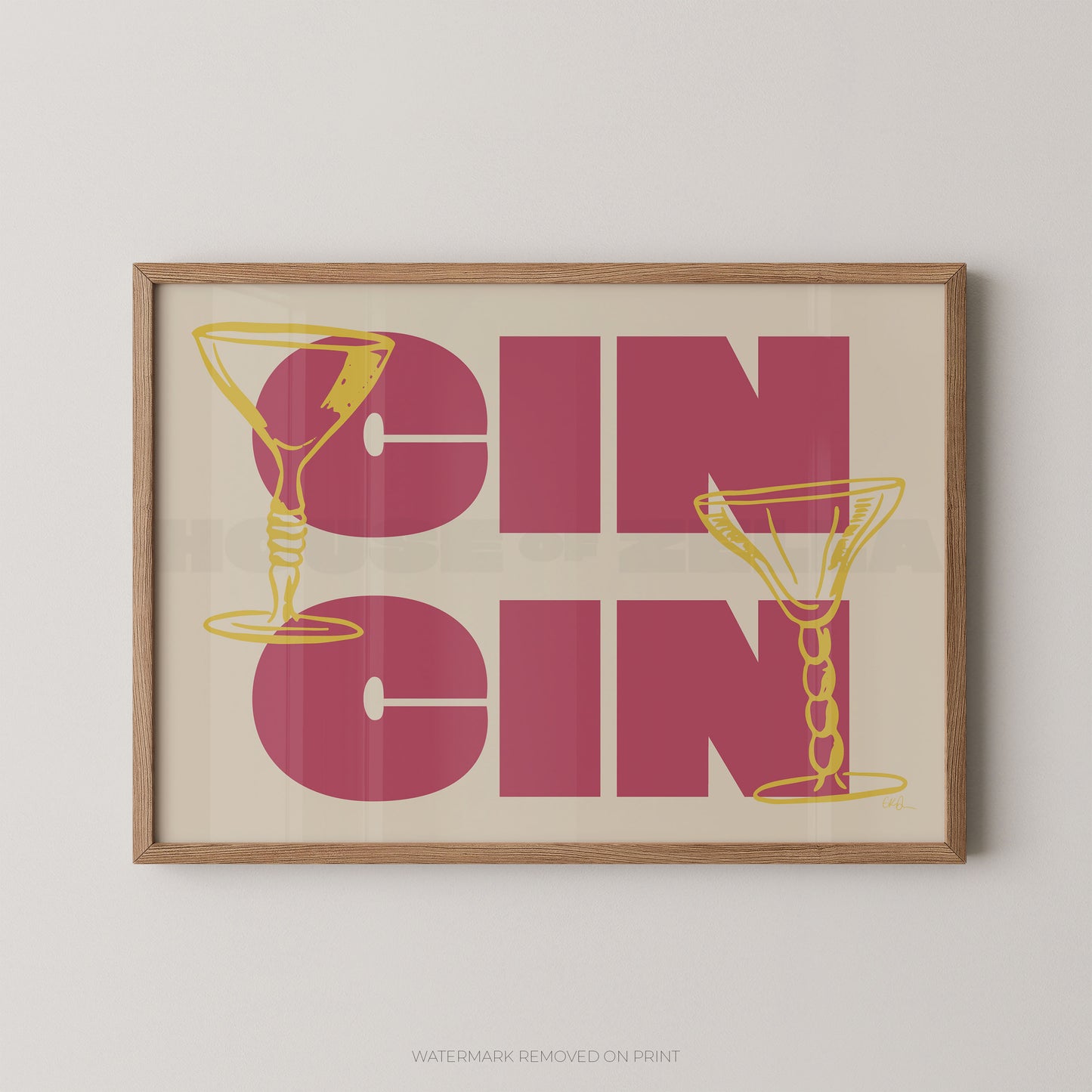 Framed artwork with 'Cin Cin' text and martini glass illustrations on a plain background