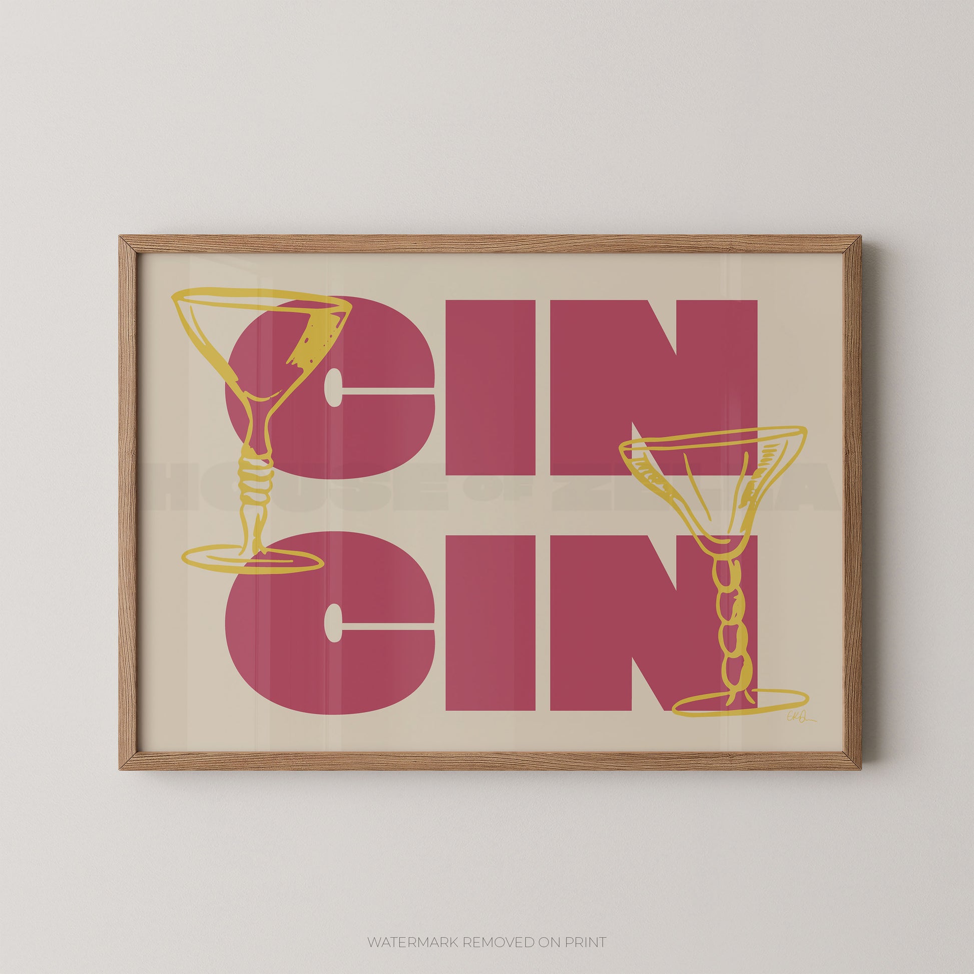 Framed artwork with 'Cin Cin' text and martini glass illustrations on a plain background