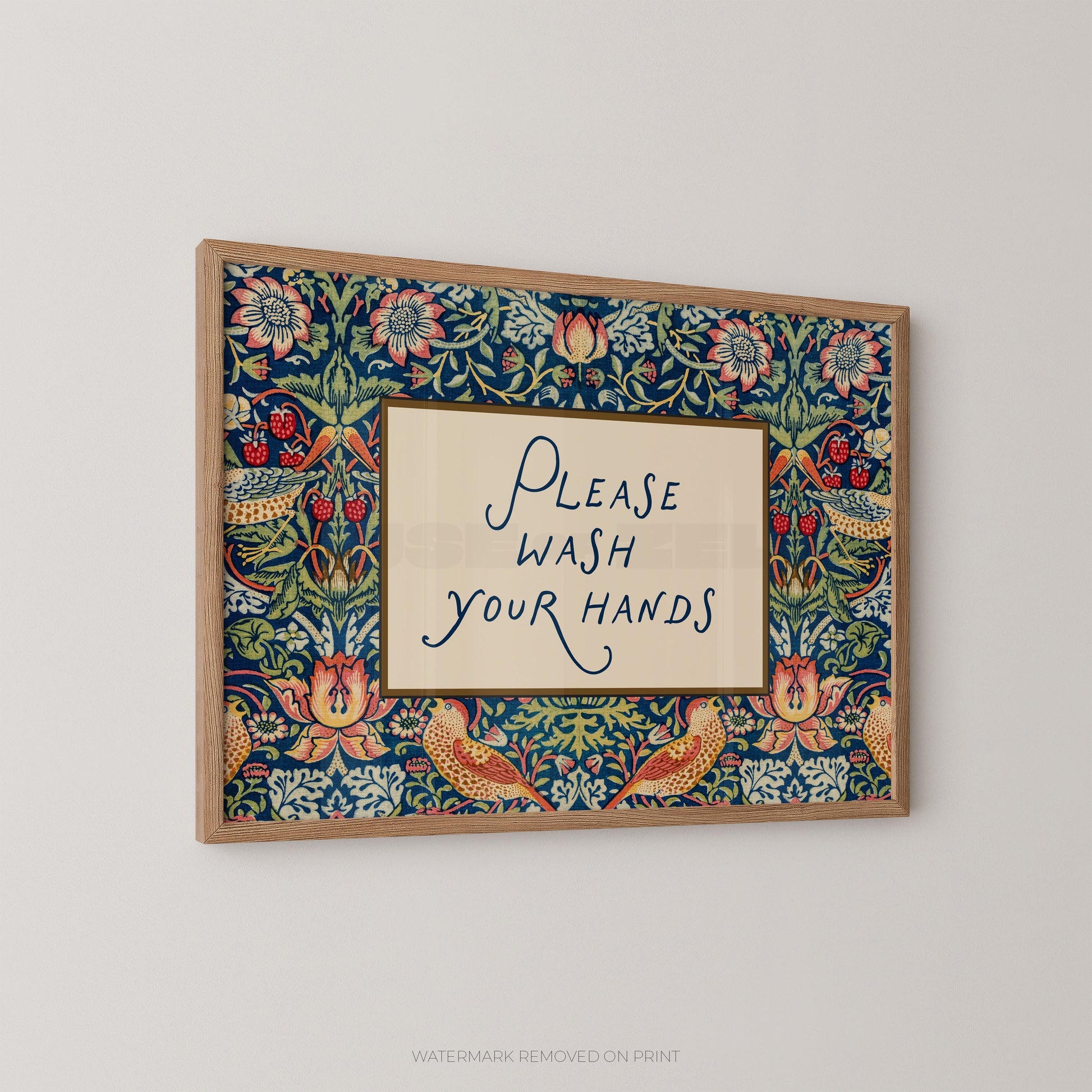 Decorative sign with floral border and 'Please Wash Your Hands' text on a plain background