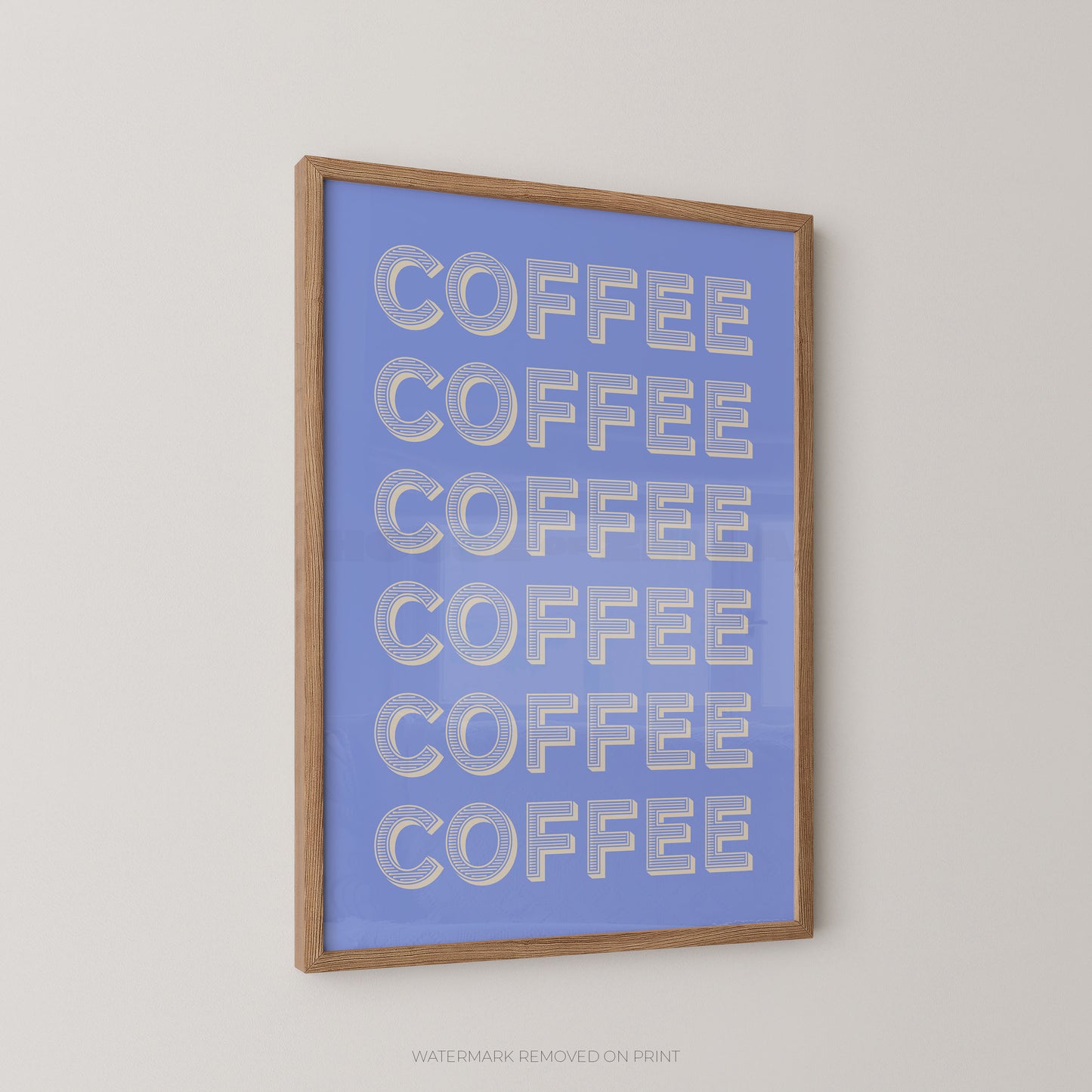 Framed wall art featuring the word 'COFFEE' repeated six times in large white letters on a light blue background, shown hanging on a plain light wall.