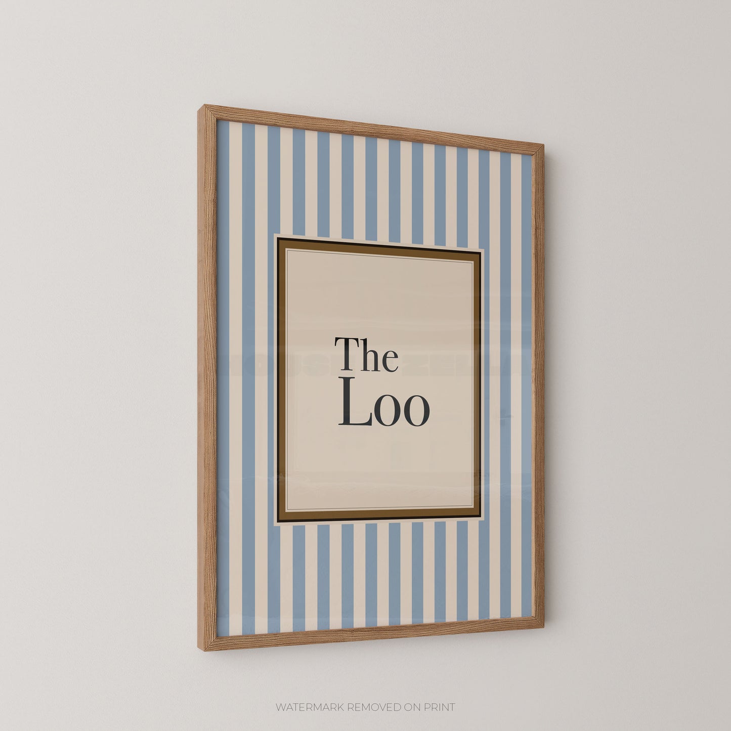 Framed artwork with 'The Loo' text on a striped background
