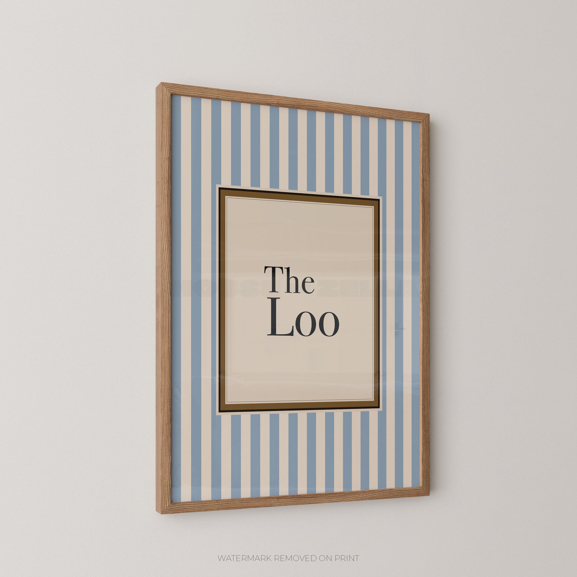 Framed artwork with 'The Loo' text on a striped background