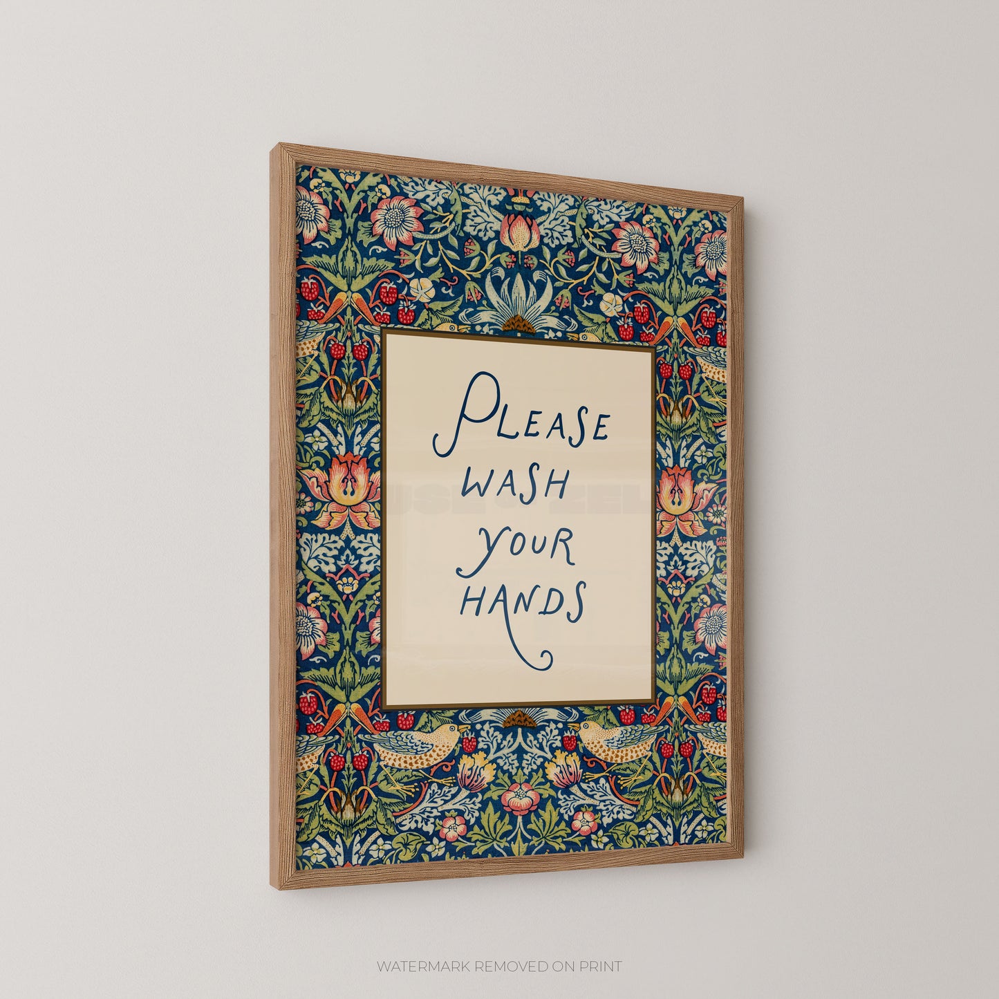 Decorative framed print with floral border and 'Please Wash Your Hands' text on a plain background
