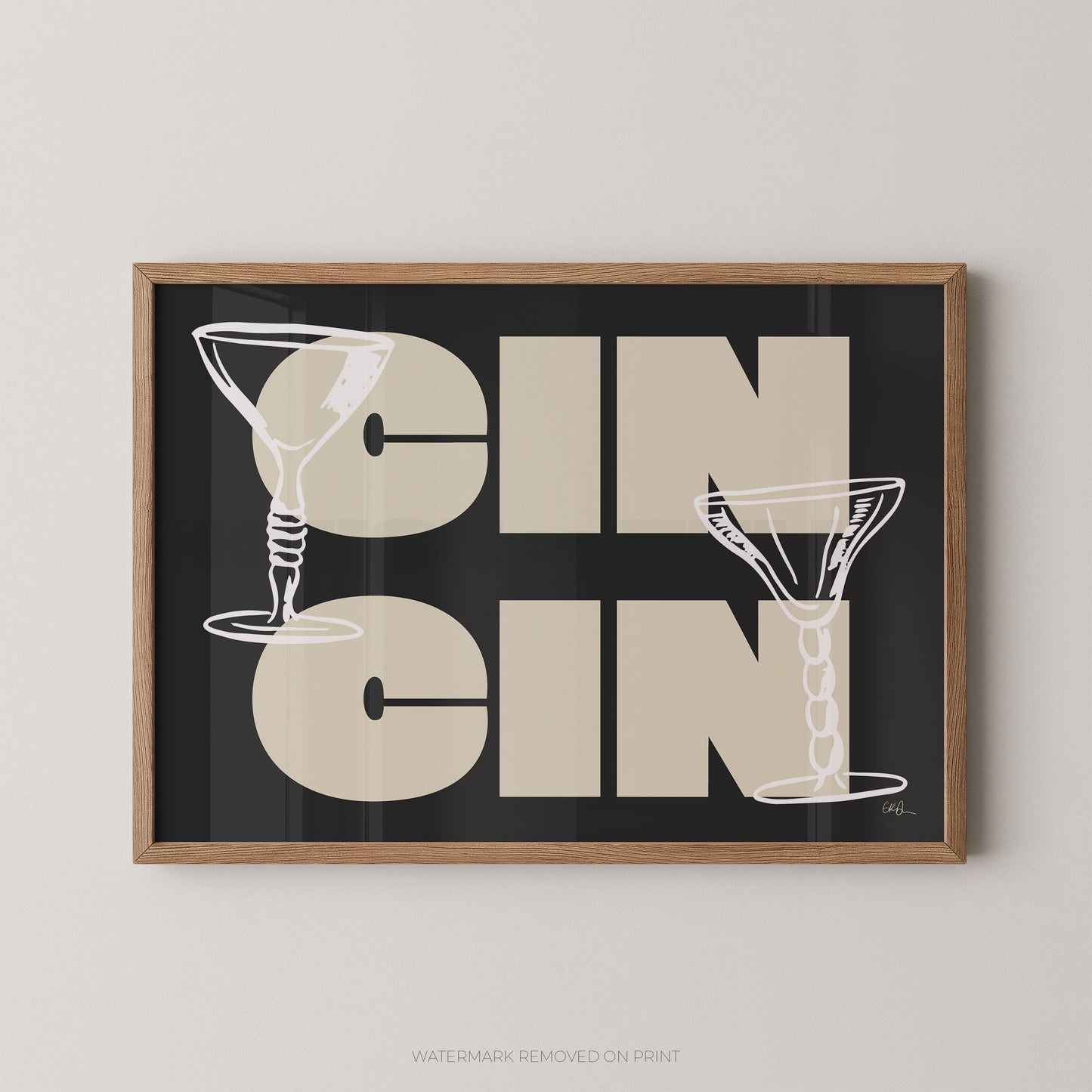 Framed artwork with 'CIN CIN' text and martini glass illustrations on a black background.
