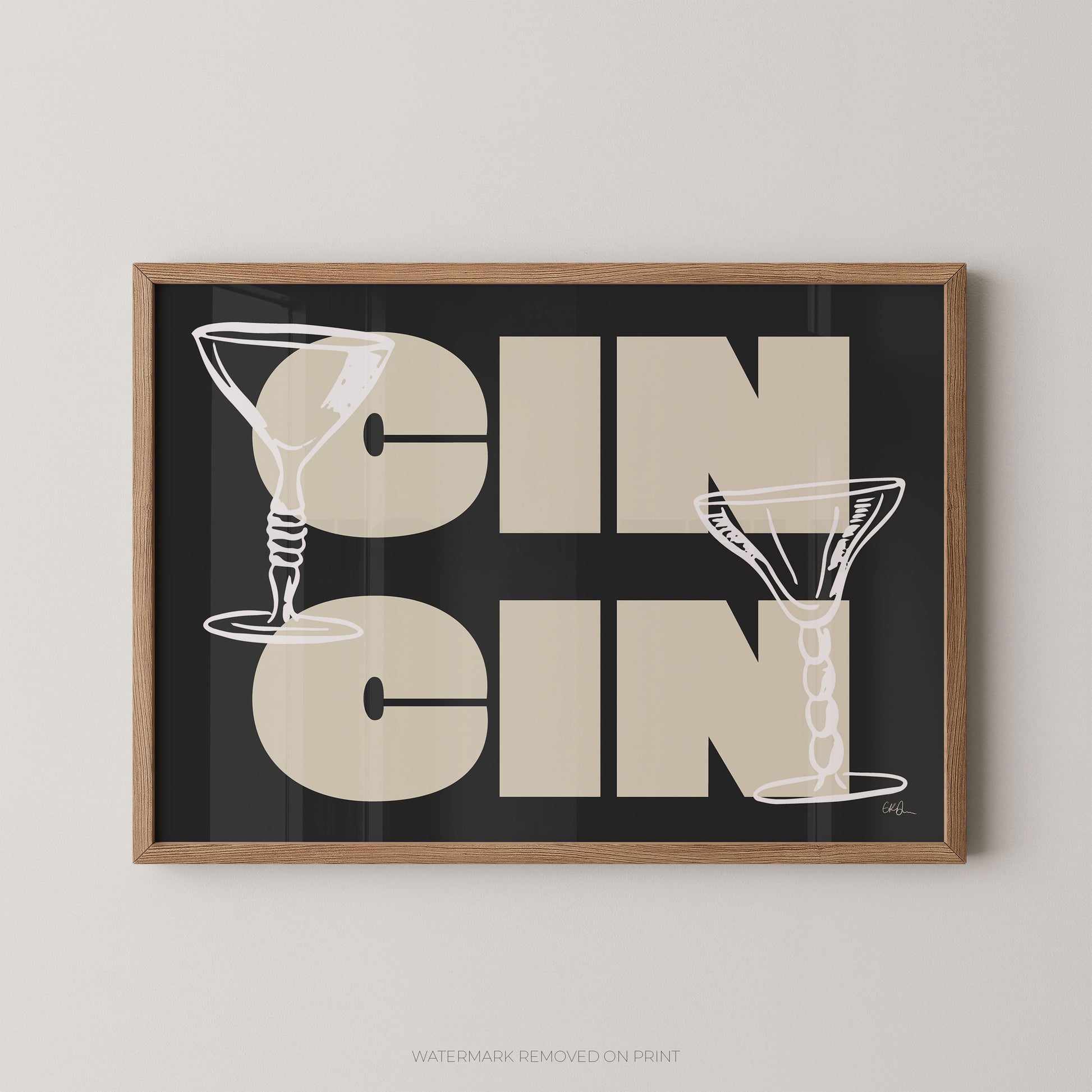 Framed artwork with 'CIN CIN' text and martini glass illustrations on a black background.