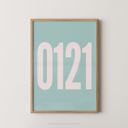A framed minimalist art print featuring '0121' in white on a light blue background, enclosed in a natural wood frame.