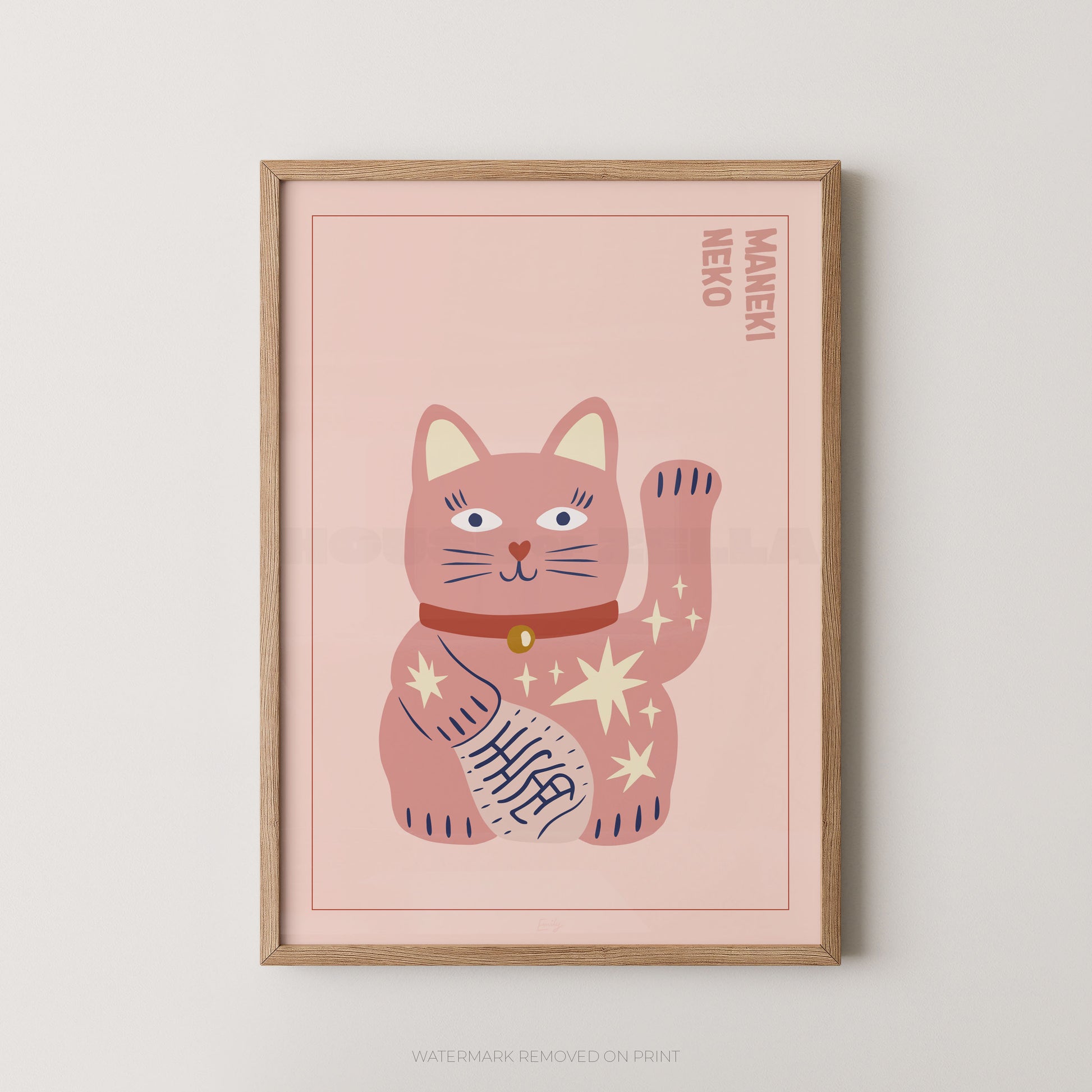 Framed artwork of a pink cat illustration on a light pink background with 'Maneki Neko' text.
