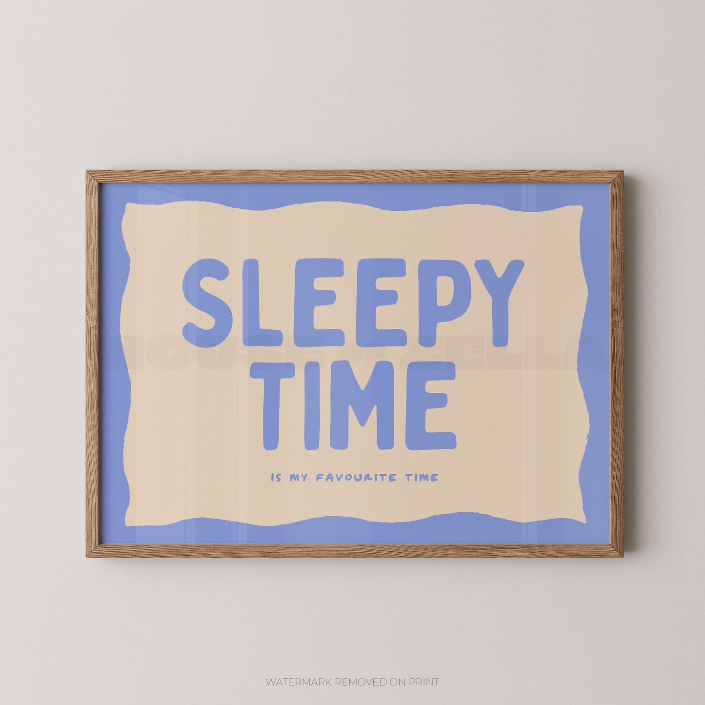 Framed artwork with 'Sleepy Time is my favourite time' text on a blue background