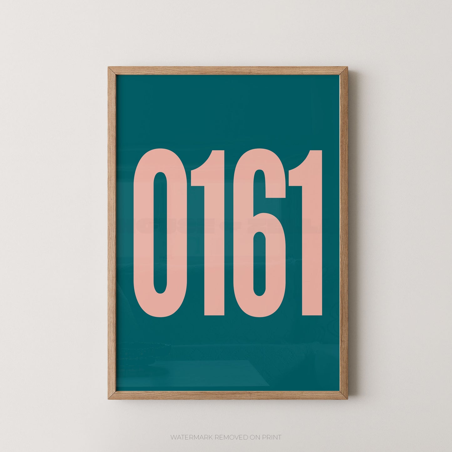Framed typographic wall art print with the numbers '0161' in large peach-pink font on a teal background, shown in a light wood frame against a light neutral wall.