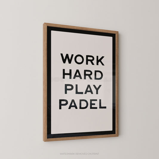 "Work Hard Play Padel bold typography sports wall art print with black lettering on a cream background with a black border, displayed at an angle in an oak frame"

