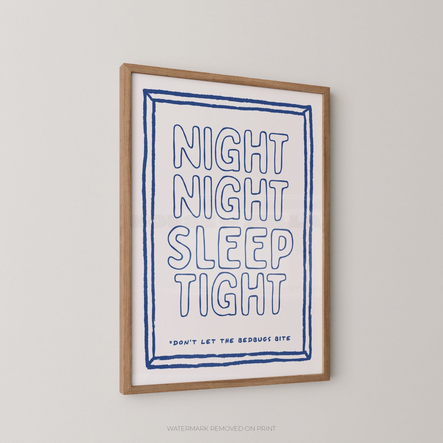 A framed typographic wall art print hanging on a light neutral wall. The print has a white background with blue hand-drawn-style lettering reading “NIGHT NIGHT SLEEP TIGHT” and smaller text below reading “DON’T LET THE REDBUGS BITE.