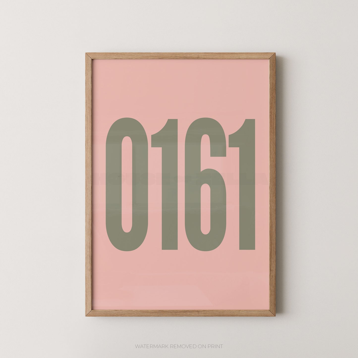 Framed minimalist wall art print with the numbers '0161' in muted olive green on a soft pink background, set in a light natural wood frame against a light gray wall.