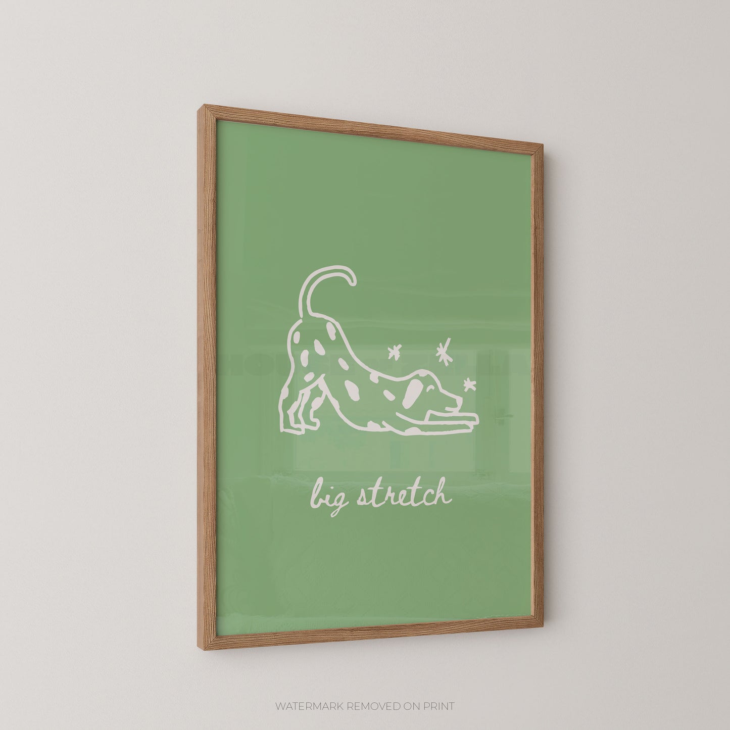 Framed green poster with a white dog illustration and 'big stretch' text on a light gray background