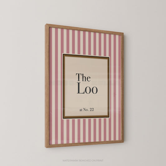 Framed print with 'The Loo at No. 22' text on a striped background