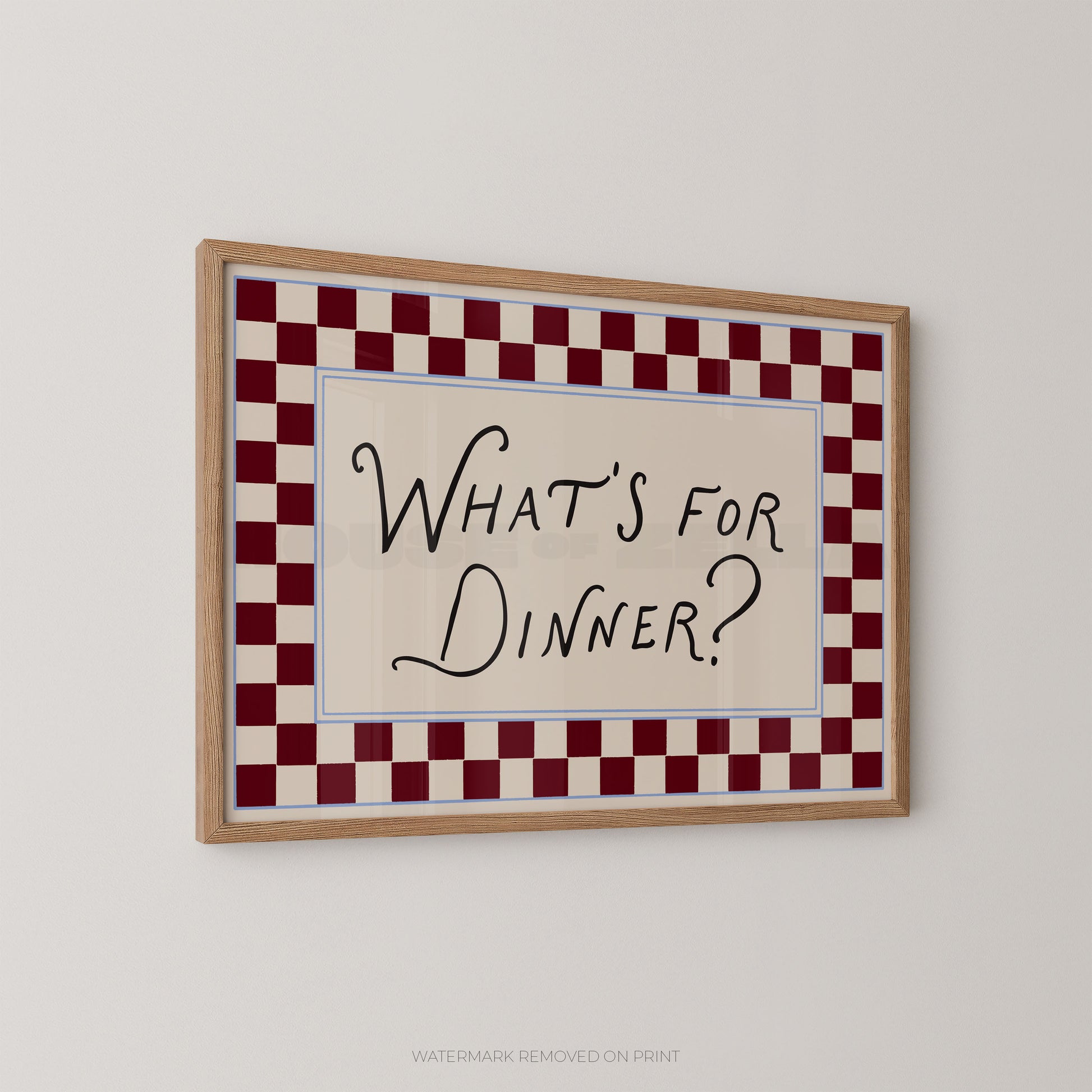 Framed sign with 'What's for Dinner?' text on a checkered border