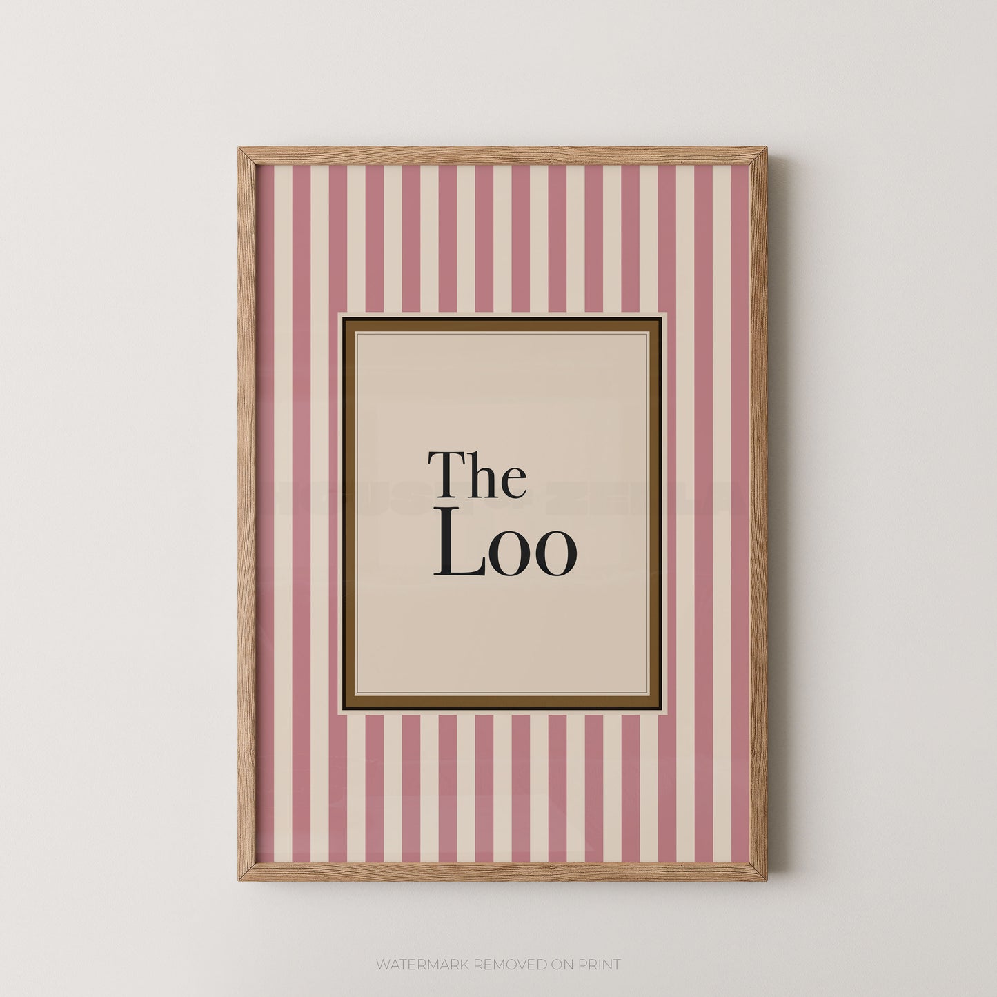 Framed artwork with 'The Loo' text on a pink and white striped background